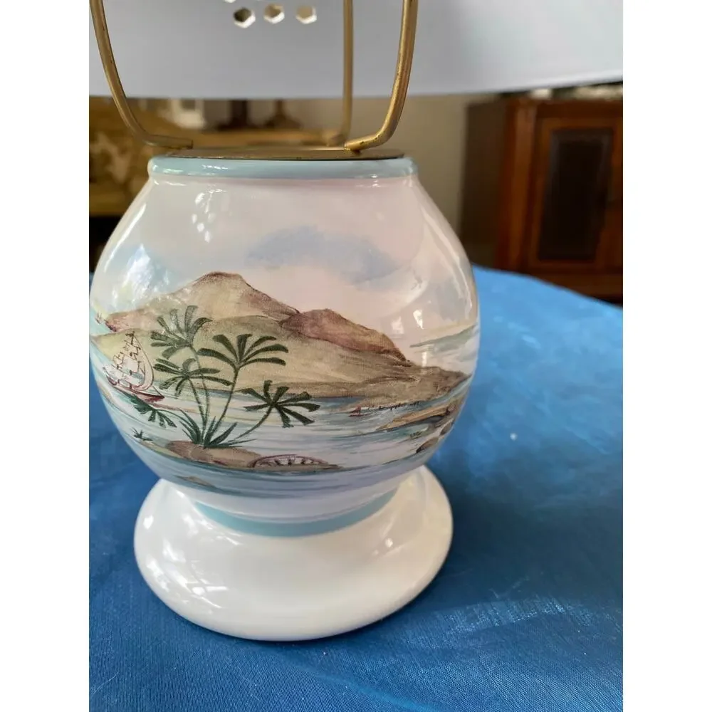 Lenox British Colonial candle lamp featuring a scenic design by Chuck Fischer